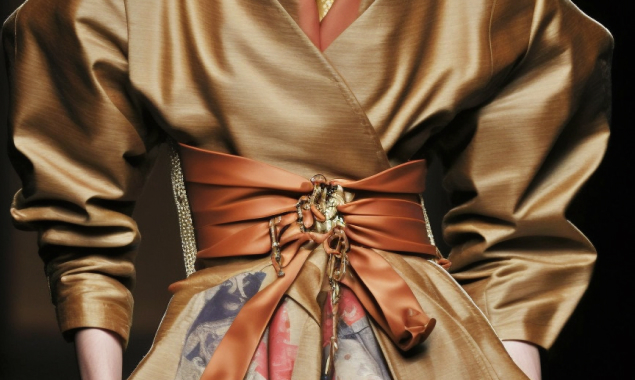 Image of the torso portion of luxury clothing on the catwalk.